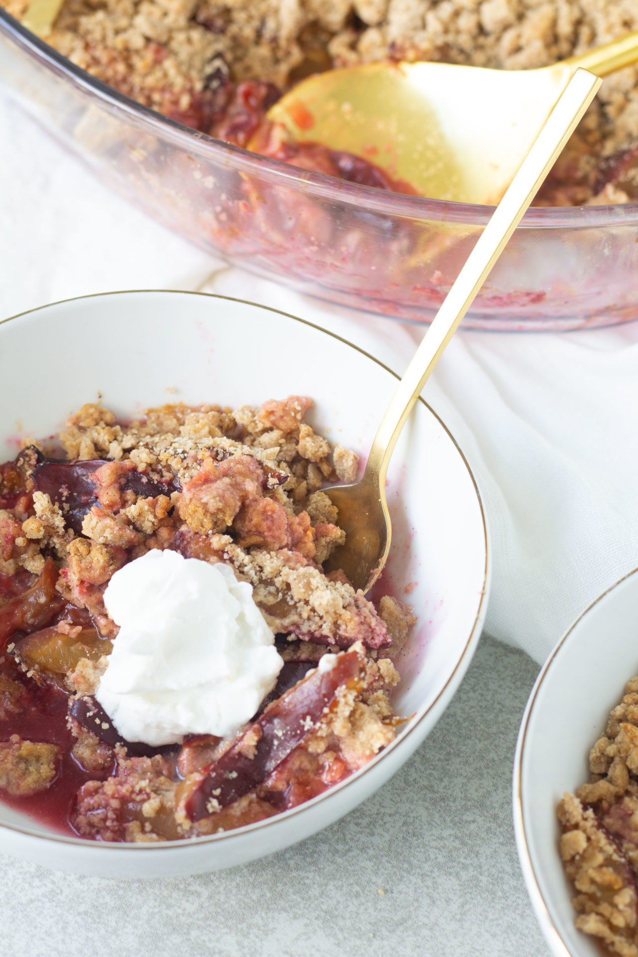 plum crumble with whipped cream