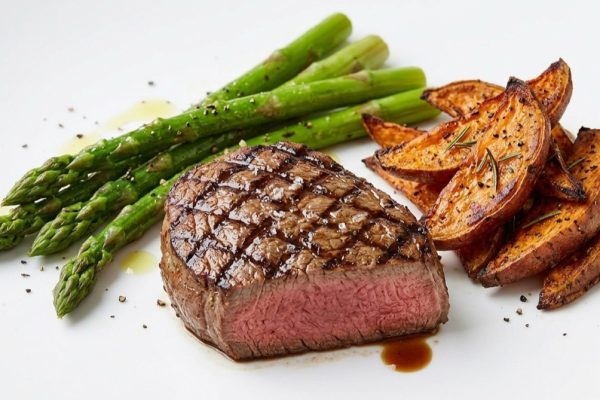 Steak with Sautéed Asparagus and Sweet Potato Wedges